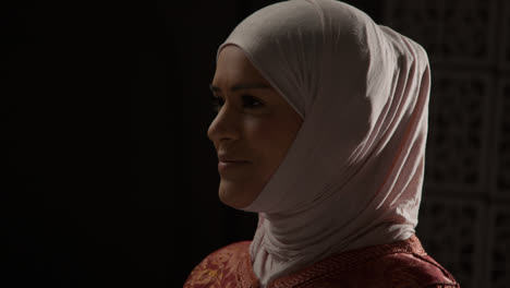 Studio-Portrait-Of-Muslim-Woman-Wearing-Hijab-Against-Plain-Background-4